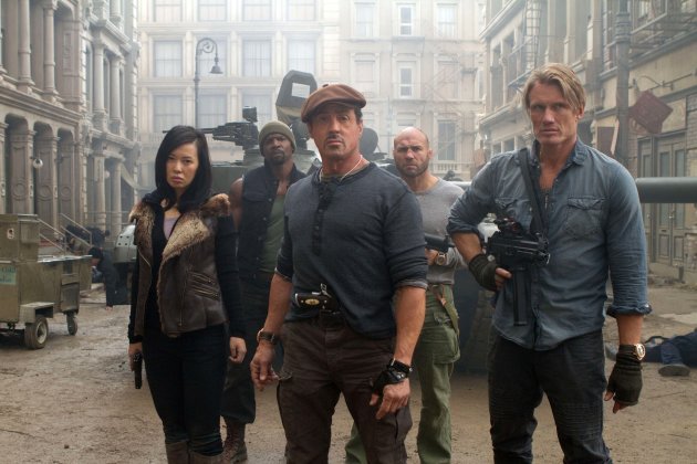 This film image released by Lionsgate shows, from left, Yu Nan, Terry Crews, Sylvester Stallone, Randy Couture and Dolph Lundgren in a scene from "The Expendables 2." The veteran action stars of "The Expendables 2" say a stuntman's on-set death served as a reminder of the danger behind building big-screen thrills. Stallone, who also co-wrote the script, told reporters this week in London that there had been deaths during two of his previous films and "it's never easy." (AP Photo/Lionsgate-Millennium Films, Frank Masi)