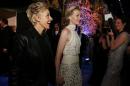 Academy Awards host Ellen Degeneres and her partner Portia de Rossi at the Governors Ball after the 86th Academy Awards in Hollywood
