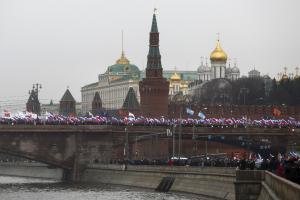 People with Russian national flags march in memory &hellip;