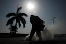 Health ministry workers fumigate against the Aedes aegypti mosquito in downtown Panama City on February 2, 2016
