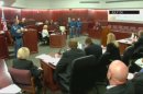 Theater Shooting Arraignment Set for Friday