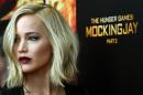 "The Hunger Games: Mockingjay - Part 2," starring Jennifer Lawrence, took the top slot at the North American box office for a fourth weekend