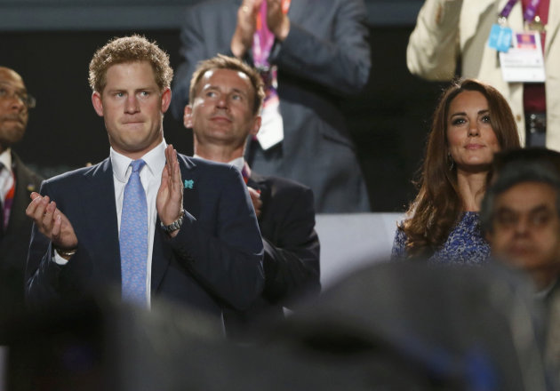 Britain's Prince Harry and Dutchess of Cambridge Kate Middleton applaud as they view the closing ceremony of the London 2012 Olympic Games