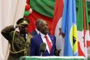 UN experts say that Rwanda recruited refugees from Burundi for combat training, with the aim of removing from power President Pierre Nkurunziza, pictured here after being sworn in for a controversial third term, in Bujumbura on August 20, 2015