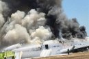 Asiana Airlines Boeing 777 is engulfed on the tarmac after crash landing at San Francisco International Airport in San Francisco