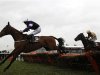 Gillies on Brindisi Breeze jumps the last fence to go on and win The Novices' Hurdle Race at the Cheltenham Festival horse racing meet in Gloucestershire