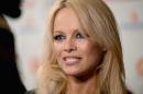 Actress Pamela Anderson, pictured on September 11, 2015, said in an open letter to British Columbia Premier Christy Clark that she is "deeply disturbed that my beloved province is allowing people to hunt and kill wolves"