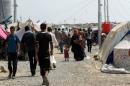 Displaced Iraqi people are seen at Debaga Camp
