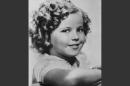 FILE - In this November 1936 file photo, 8-year-old U.S. American child movie star Shirley Temple is portrayed in Hollywood, Calif. Shirley Temple, the curly-haired child star who put smiles on the faces of Depression-era moviegoers, has died. She was 85. Publicist Cheryl Kagan says Temple, known in private life as Shirley Temple Black, died Monday night, Feb. 10, 2014, surrounded by family at her home near San Francisco. (AP Photo/File)