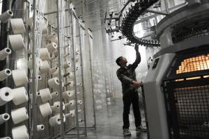 A labourer works in a clothing factory in Bozhou, east&nbsp;&hellip;