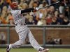 Cincinnati Reds' Brandon Phillips swings on a two-run home run in the third inning of Game 1 of the National League division baseball series against the San Francisco Giants in San Francisco, Saturday, Oct. 6, 2012. (AP Photo/Eric Risberg)