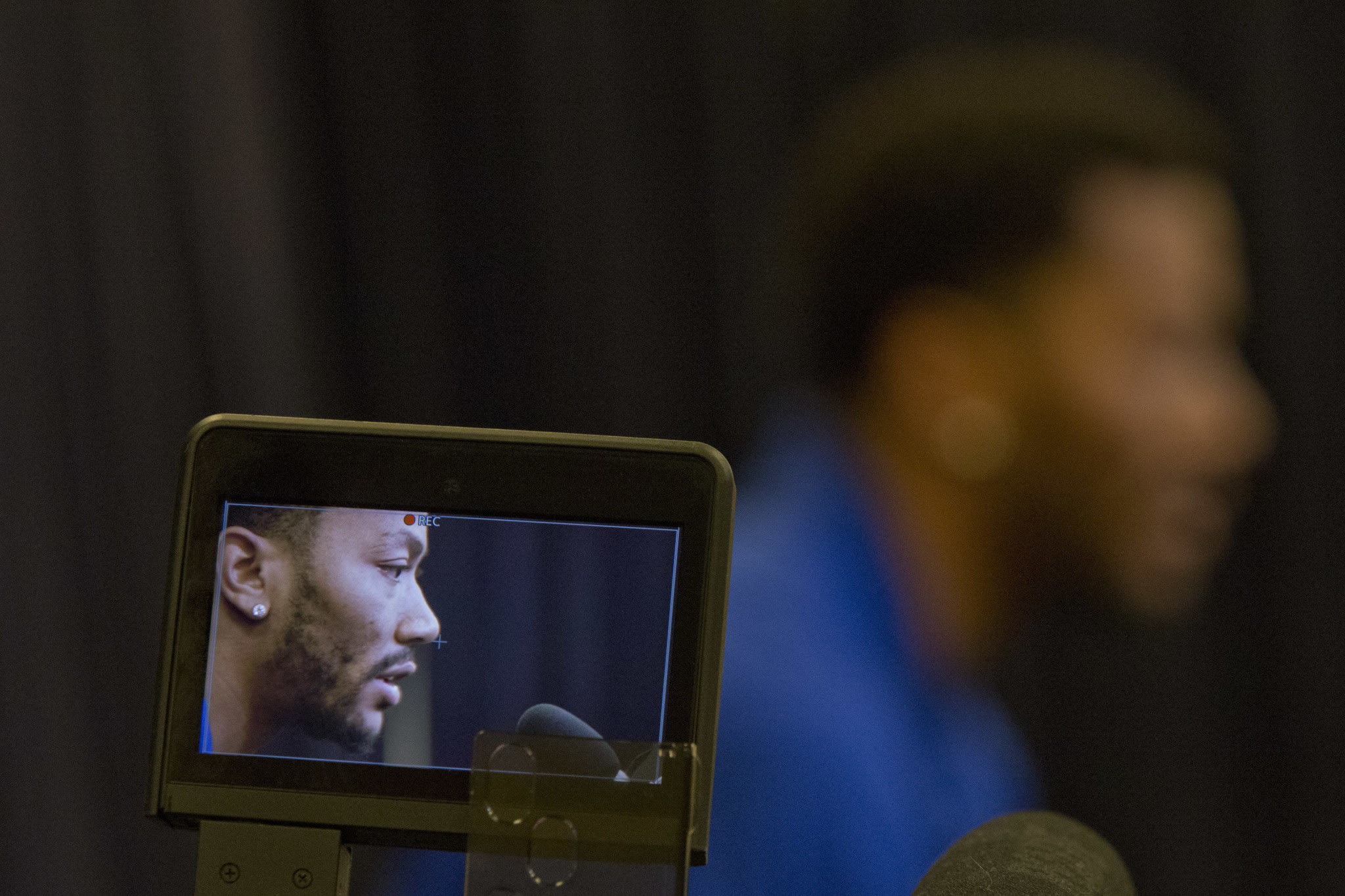 Derrick Rose is displayed on the screen of a video camera as he speaks during a news conference at Madison Square Garden, Friday, June 24, 2016, in Ne...