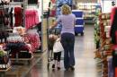 A woman shops with her daughter at a Walmart Supercenter in Rogers