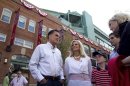 FILE - In this April 16, 2012 file photo, Republican presidential candidate, former Massachusetts Gov. Mitt Romney and his wife Ann, are seen outside Fenway Park baseball stadium in Boston. Don't bet on Mitt Romney winning his home state. Or even trying. 