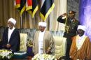Sudanese President Omar al-Bashir (centre) takes part in his swearing in ceremony for another term of five years at the parliament in Khartoum, on June 2, 2015