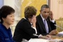 US President Barack Obama sits next to Brazilian President Dilma Rousseff during the start of the G20 Working Session at the Konstantin Palace in St. Petersburg