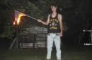 Handout of photograph posted to a website with a racist manifesto appears to show Dylann Roof, the suspect in Wednesday's Charleston church massacre, posing with a burning American flag in an unknown location
