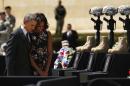 Barack and Michelle Obama pay respects for slain soldiers at conclusion of memorial service at Fort Hood
