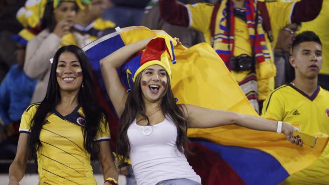 Colombia fans celebrate ahead of their team&#39;s first round Copa America 2015 soccer match against Brazil at Estadio Monumental David Arellano in Santiago