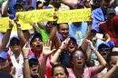 Supporters of opposition leader Capriles take part in a demonstration to demand a recount of the votes in Sunday's election, in Maracaibo