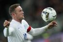 England striker Wayne Rooney controls the ball on March 31, 2015 during a friendly football match Italy vs. England at the Juventus Stadium in Turin
