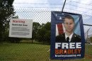 Poster with face of U.S. Army PFC Bradley Manning outside main gate of U.S. Army Ft. Meade in Maryland