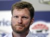 Driver Dale Earnhardt Jr pauses as he talks about missing the next two races with his second concussion in the past six weeks during a news conference prior to practice for Saturday's NASCAR Bank of America 500 NASCAR Sprint Cup series auto race in Concord, N.C., Thursday, Oct. 11, 2012. (AP Photo/Chuck Burton)