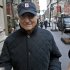 FILE - In this Dec. 17, 2008 file photo, Bernard Madoff returns to his Manhattan apartment after making a court appearance in New York.  In December 2008, two of Bernard Madoff's most loyal employees met on a Manhattan street corner and fretted over a closely held secret that the rest of the world would learn about eight days later: that their boss, Madoff,  was a con man for the ages.  The exchange was recounted for the first time in a newly rewritten indictment this week expanding the case and charges against five defendants headed for a trial next year. The indictment brings into sharper focus the final few years of a fraud the government says dated to at least the early 1970s, two decades before Madoff claimed it began and well before 1992, when the government said in its original case against the defendants that the conspiracy began. (AP Photo/Jason DeCrow, File)
