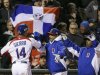 Dominican Republic's Moises Sierra (14) celebrates after scoring during the fifth inning of a semifinal game of the World Baseball Classic against the Netherlands in San Francisco, Monday, March 18, 2013. (AP Photo/Eric Risberg)