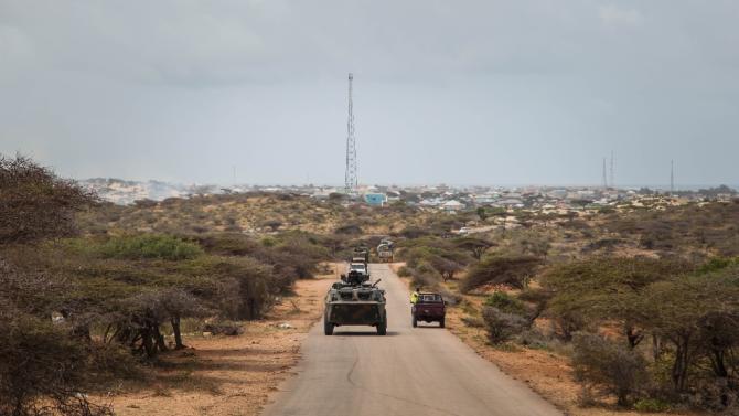 In a photograph taken on July 18, 2013 and released by the African Union-United Nations Information Support Team an AMISOM convoy carrying troops from the Sierra Leone and Kenyan travels in Kismayo, Somalia