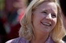 U.S. Senate candidate Liz Cheney speaks with voters during a Republican and Tea Party gathering in Emblem, Wyoming