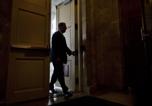 House Speaker John Boehner of Ohio arrives on Capitol Hill in Washington, Friday, Oct. 11, 2013. President Barack Obama and Republicans in the House of Representatives are exploring whether they can end a budget standoff that has triggered a partial government shutdown and put Washington on the verge of an economy-jarring federal default. (AP Photo/ Evan Vucci)