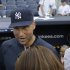 New York Yankees shortstop Derek Jeter, who is on the disabled list, talks to members of the media before an interleague baseball game  against the New York Mets at Yankee Stadium in New York, Wednesday, May 29, 2013. (AP Photo/Kathy Willens)
