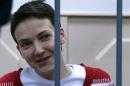 Ukrainian pilot Nadiya Savchenko inside a defendants' cage during a hearing at the Basmanny district court in Moscow, on March 4, 2015