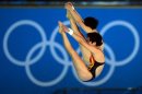 China's Chen Ruolin and Wang Hao compete in the women's synchronised 10m platform final