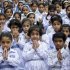 Students attend special prayers for the recovery of Malala Yousufzai, who was shot by the Taliban, in Lahore