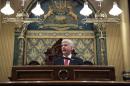 Michigan Gov. Rick Snyder delivers his State of the State address to a joint session of the House and Senate, Tuesday, Jan. 19, 2016, at the state Capitol in Lansing, Mich. (AP Photo/Al Goldis)