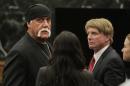 Hulk Hogan, whose given name is Terry Bollea, left, looks on in court moments after a jury returned its decision Monday, March 21, 2016, in St. Petersburg, Fla. A jury has hit Gawker Media with $15 million in punitive damages and its owner with $10 million, adding to the $115 million it awarded last week for publishing a sex video of Hogan. (Dirk Shadd/The Tampa Bay Times via AP, Pool) NEW YORK POST OUT