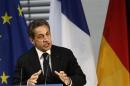 Former French President Sarkozy gesture during his speech at an event hosted by the Konrad-Adenauer foundation in Berlin