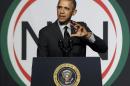 President Barack Obama gestures while speaking at a National Action Network conference Friday, April 11, 2014, in New York. (AP Photo/Frank Franklin II)