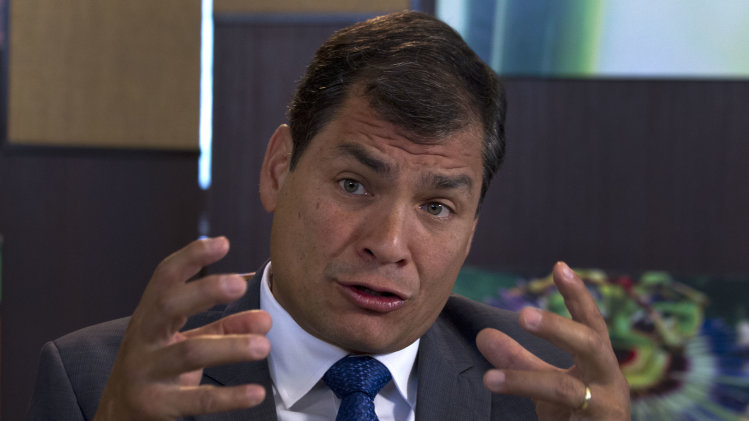 Ecuador's President Rafael Correa, speaks during a interview with The Associated Press in Portoviejo, Ecuador, Sunday, June 30, 2013. Correa said he had no idea Snowden’s intended destination was Ecuador when he fled Hong Kong for Russia last week. He said the Ecuadorean consul in London committed “a serious error” without consulting any officials in the capital, Quito, when the consul issued a letter of safe passage for Snowden.(AP Photo/Martin Mejia)