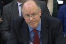 A video grab shows BBC director general George Entwistle appearing before a Culture and Media Committee hearing at Parliament in London