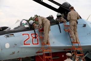 Russian servicemen assist air force pilots in a Sukhoi &hellip;