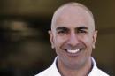 California Republican gubernatorial candidate Kashkari poses after touring the Robinson Helicopter Co. in Torrance