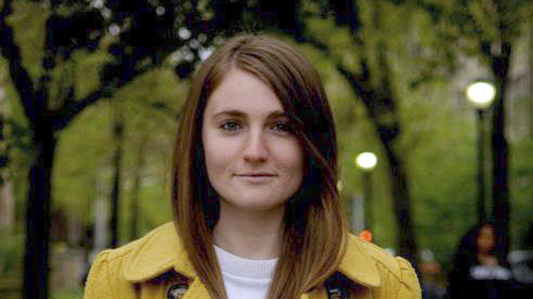 This undated photo released by the Keegan family shows Marina Keegan, of Wayland, Mass., on the Yale University campus in New Haven, Conn. Marina, who graduated from Yale less than a week earlier, died at the scene of an automobile crash in Dennis, Mass., Saturday, May 26, 2012.  Her writing had been published in The New York Times, and she had accepted a job at The New Yorker. Her final Yale Daily News column was widely shared on social media, where she had implored her classmates to "make something happen to this world."  (AP Photo/Keegan Family)