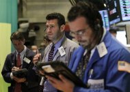 Traders work on the floor of the New York Stock Exchange, October 12, 2012. REUTERS/Brendan McDermid