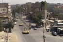 This image made from video provided by Shaam News Network Tuesday, July 17, 2012, purports to show Syrian tanks in Damascus, Syria. (AP Photo/Shaam News Network via AP video) THE ASSOCIATED PRESS HAS NO WAY OF INDEPENDENTLY VERIFYING THE CONTENT, LOCATION OR DATE OF THIS PICTURE.