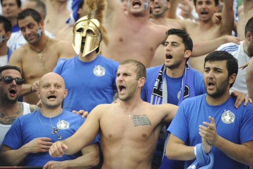 Greece fans cheer ahead of Euro 2012 soccer match between Poland and Greece in Warsaw