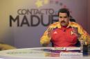 Venezuela's President Nicolas Maduro speaks during his weekly broadcast "en contacto con Maduro" (In contact with Maduro) at the Miraflores Palace in Caracas