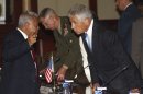 U.S. Defense Secretary Chuck Hagel, right, leans to listen to Indonesian Defense Minister Purnomo Yusgiantoro prior to the start of their meeting in Jakarta, Indonesia, Monday, Aug. 26, 2013. (AP Photo/Dita Alangkara)